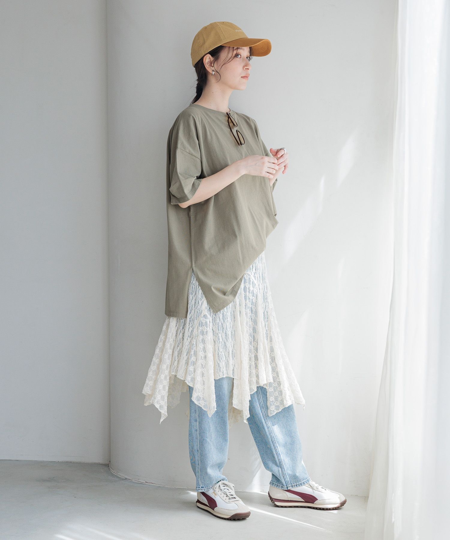 Slip skirt layered over straight leg jeans